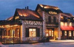 Exterior of La Madeleine restaurant at dusk
