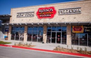 Russo's New York Pizzeria storefront with glass windows