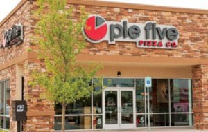 Pie Five Pizza storefront with tree